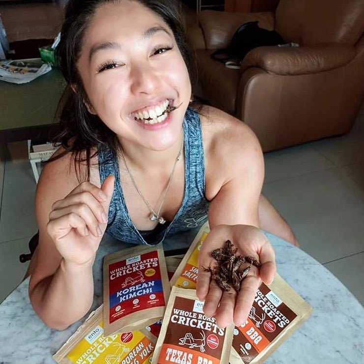 Girl eating Ento's cricket snacks