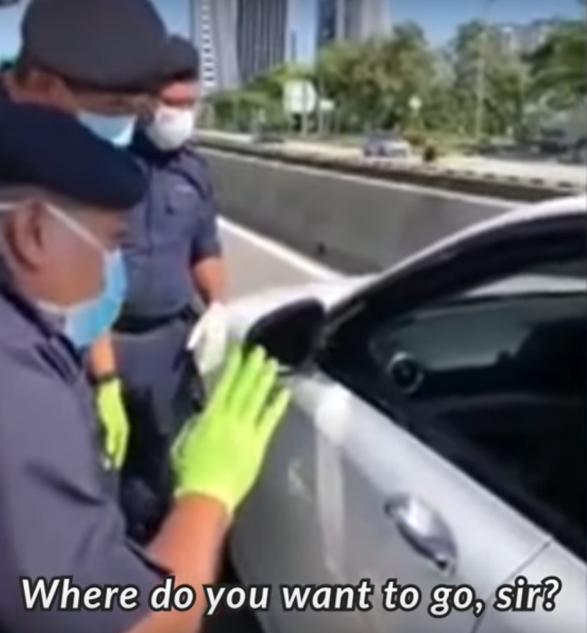 Police inspecting cars