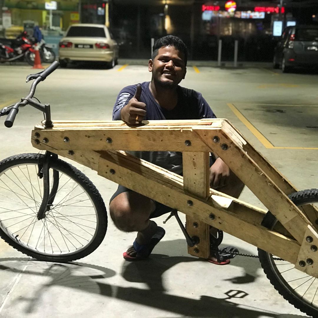 naviin with his diy bicycle
