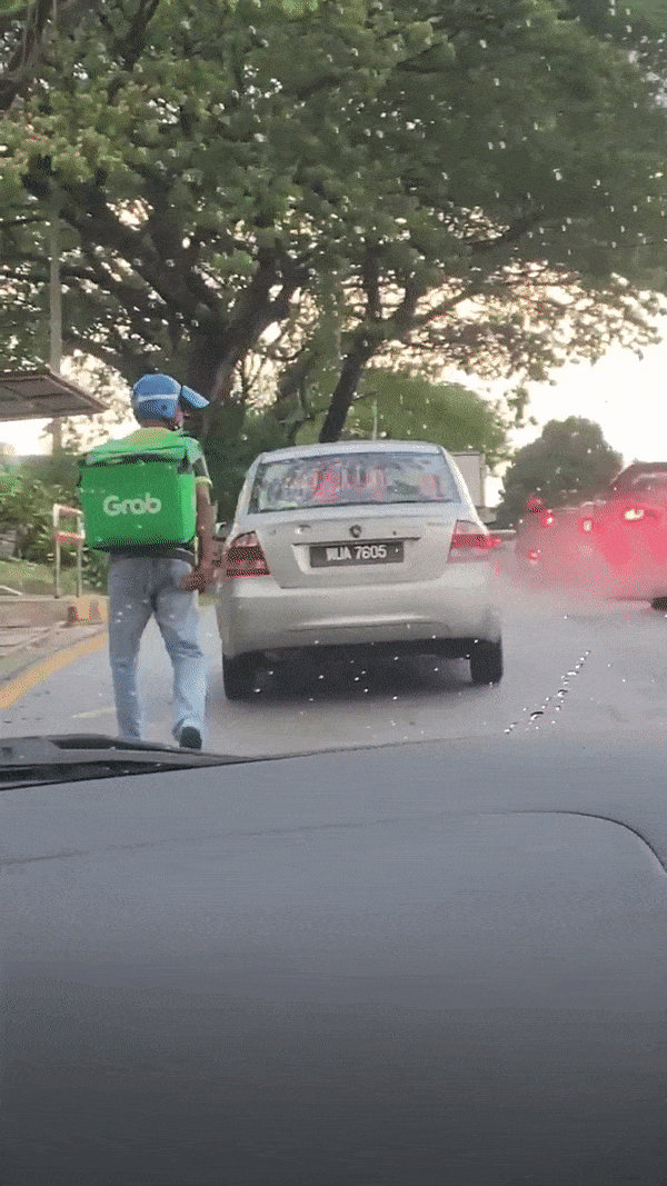 GrabFood driver looks for lost kitten