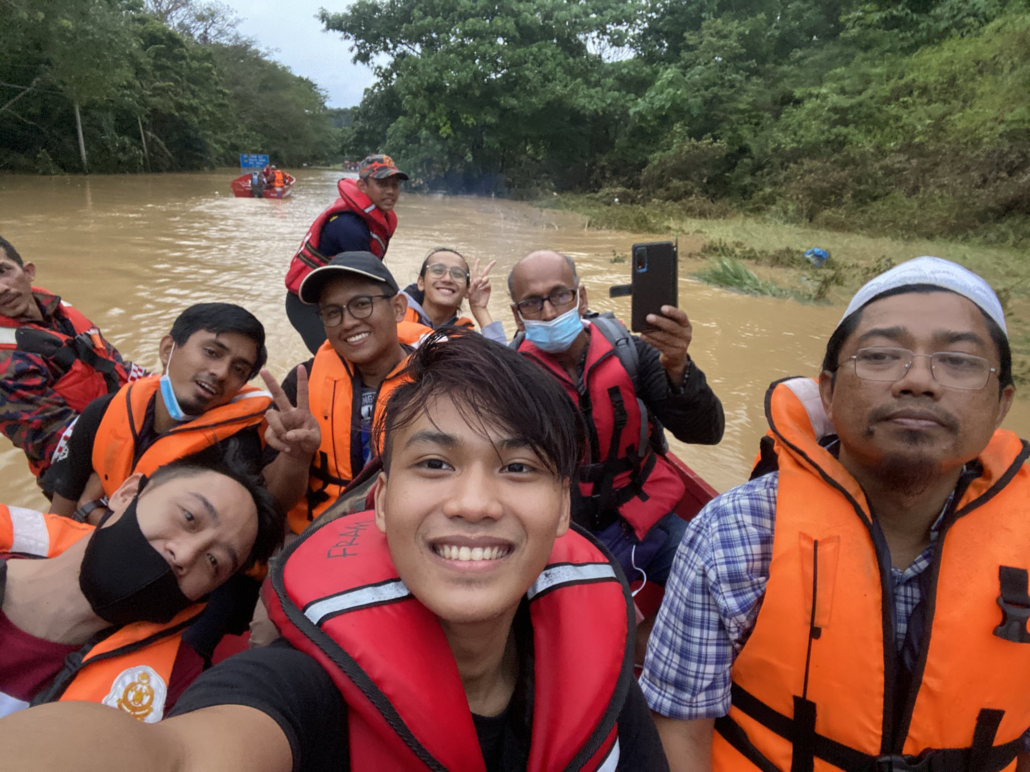 passengers on a rescue boat