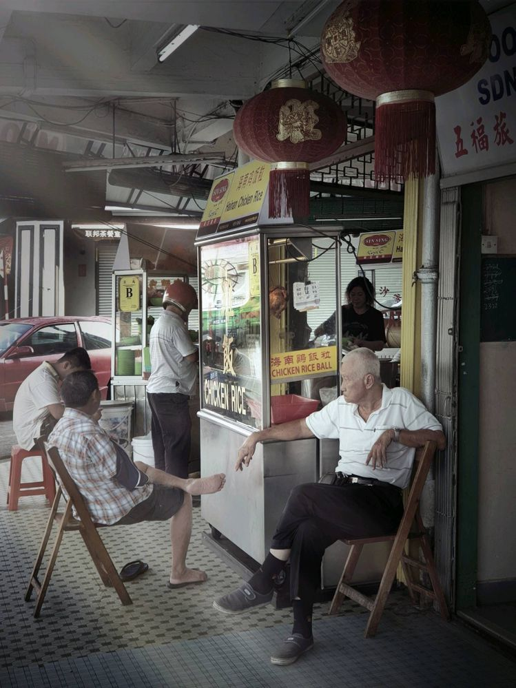 old men gathering at a kopitiam