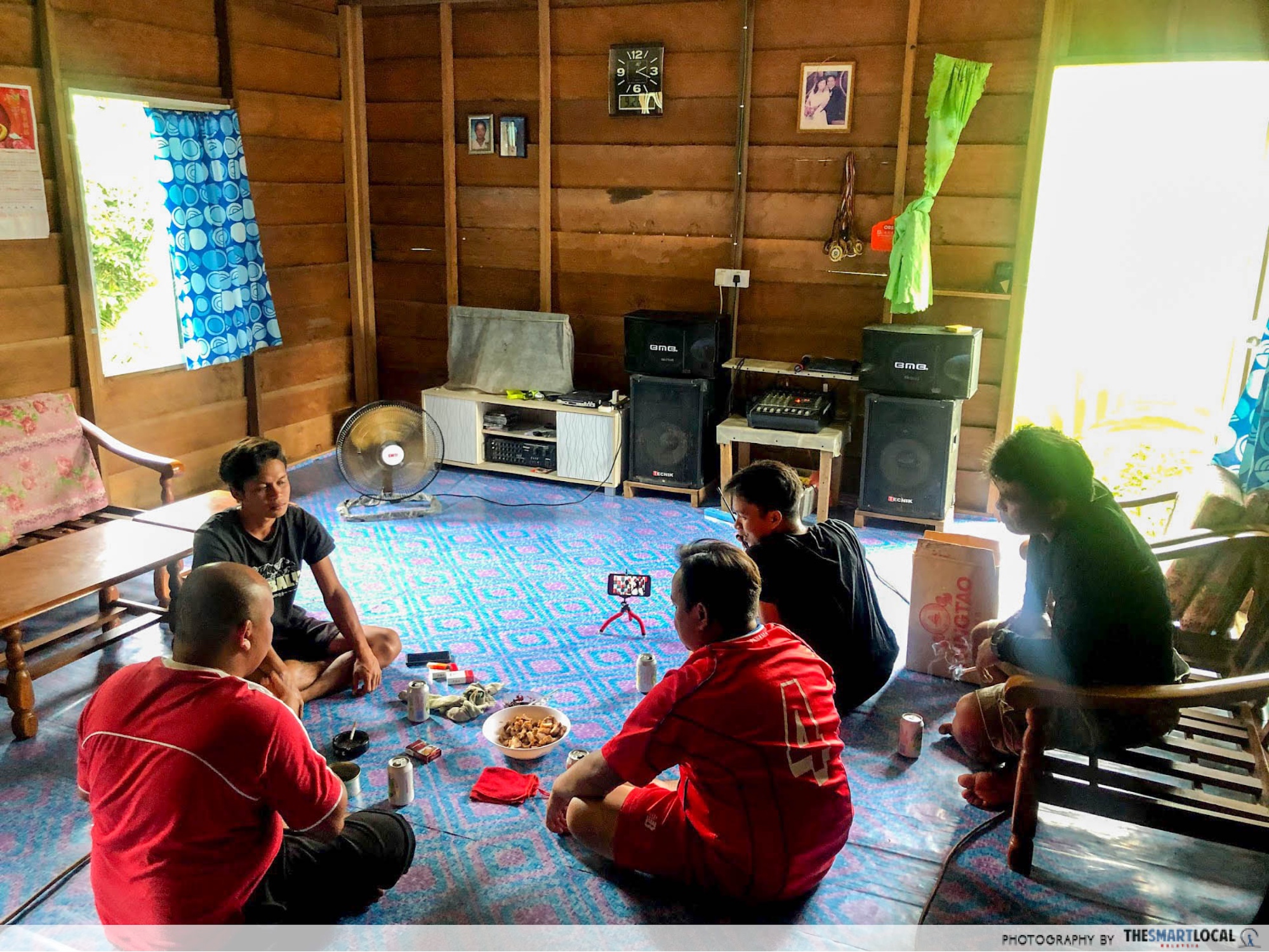 local villagers sharing a meal