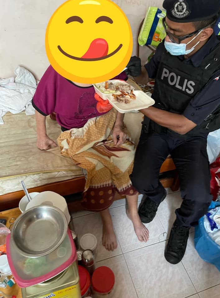 Policeman consoles elderly auntie - policeman feeds auntie
