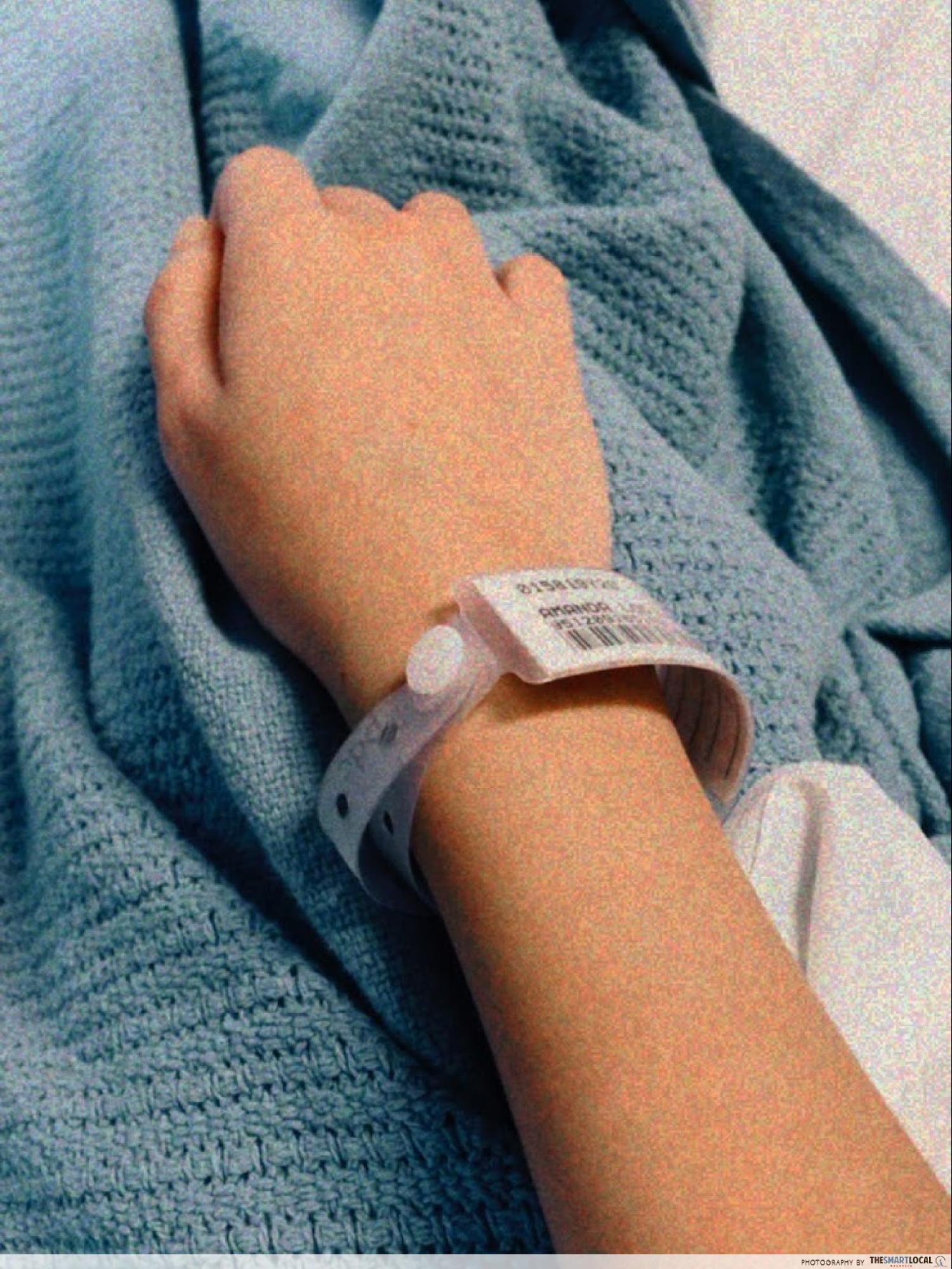 hospital admission tag on wrist