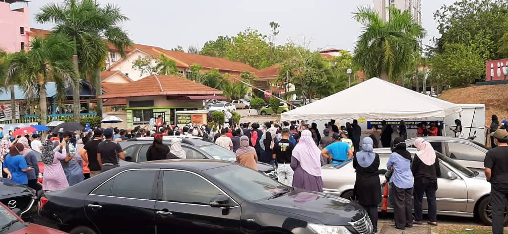 parents waiting crowd school