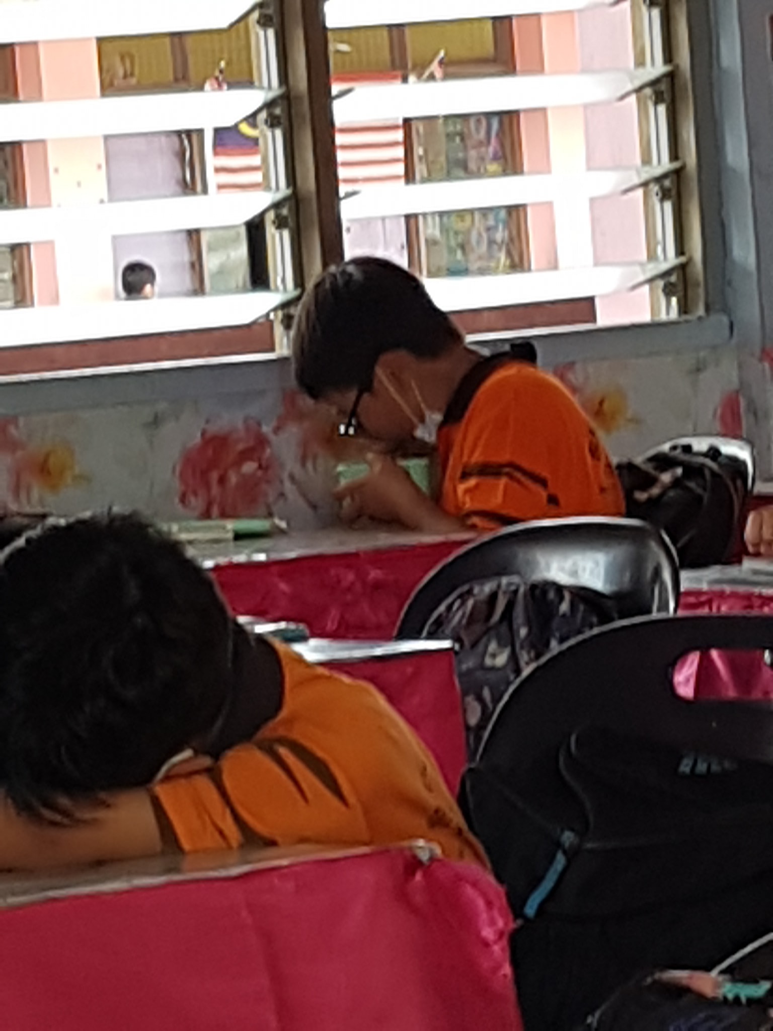 Student discretely eats lunch in respect of others during Ramadan - student