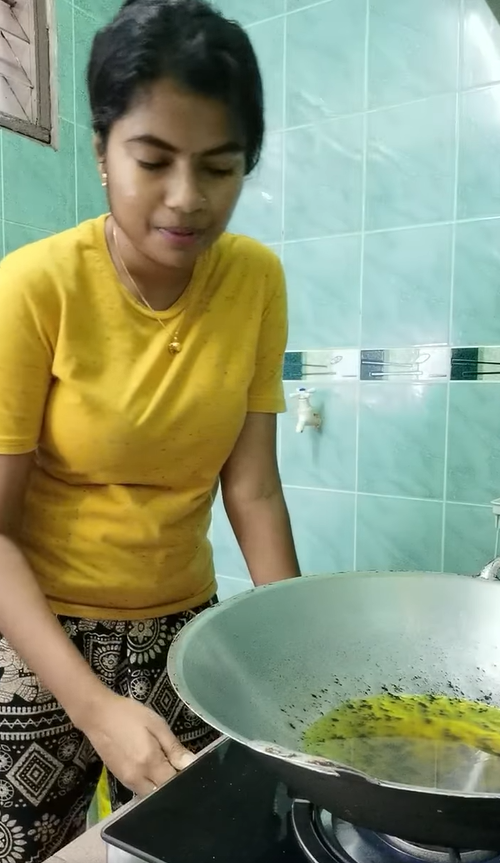 Woman - kitchen - pan