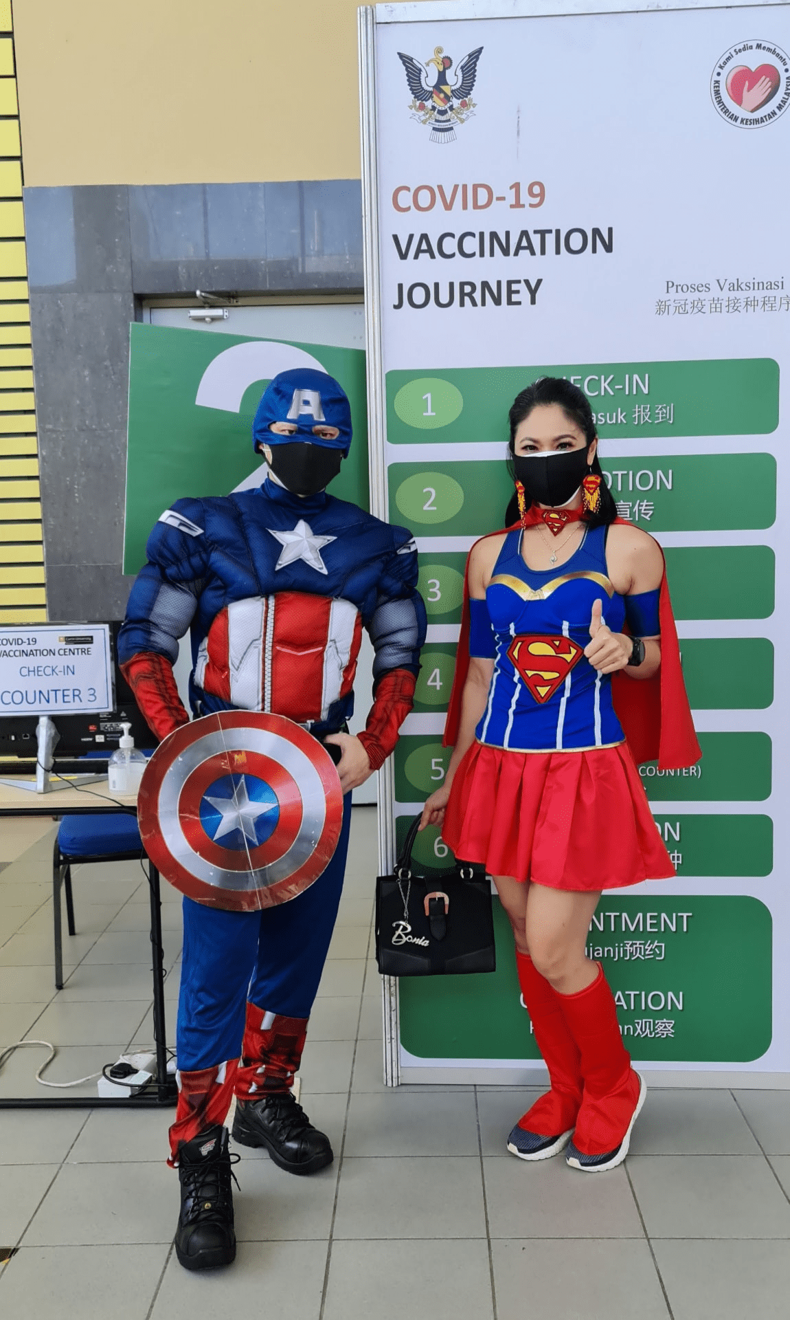 Malaysians wear costumes to vaccination - Captain America
