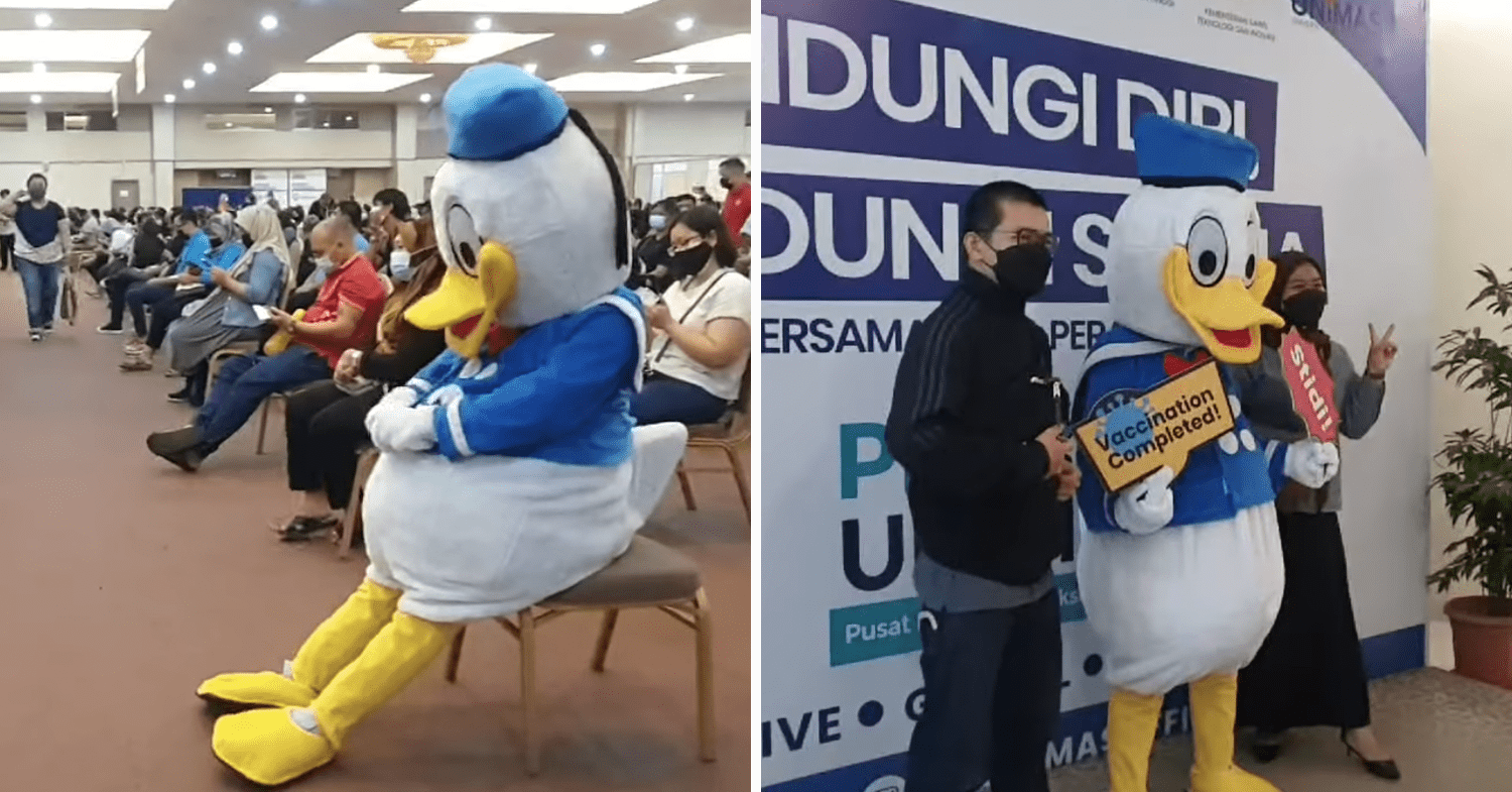 Malaysians wear costumes to vaccination - Donald Duck