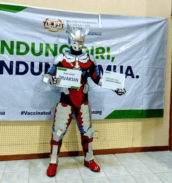 Malaysians wear costumes to vaccination - Ultraman