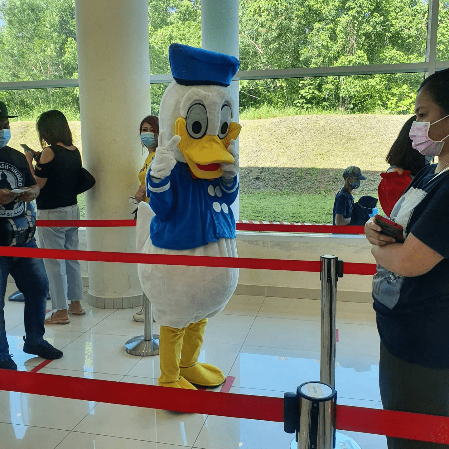 Malaysians wear costumes to vaccination - Donald Duck