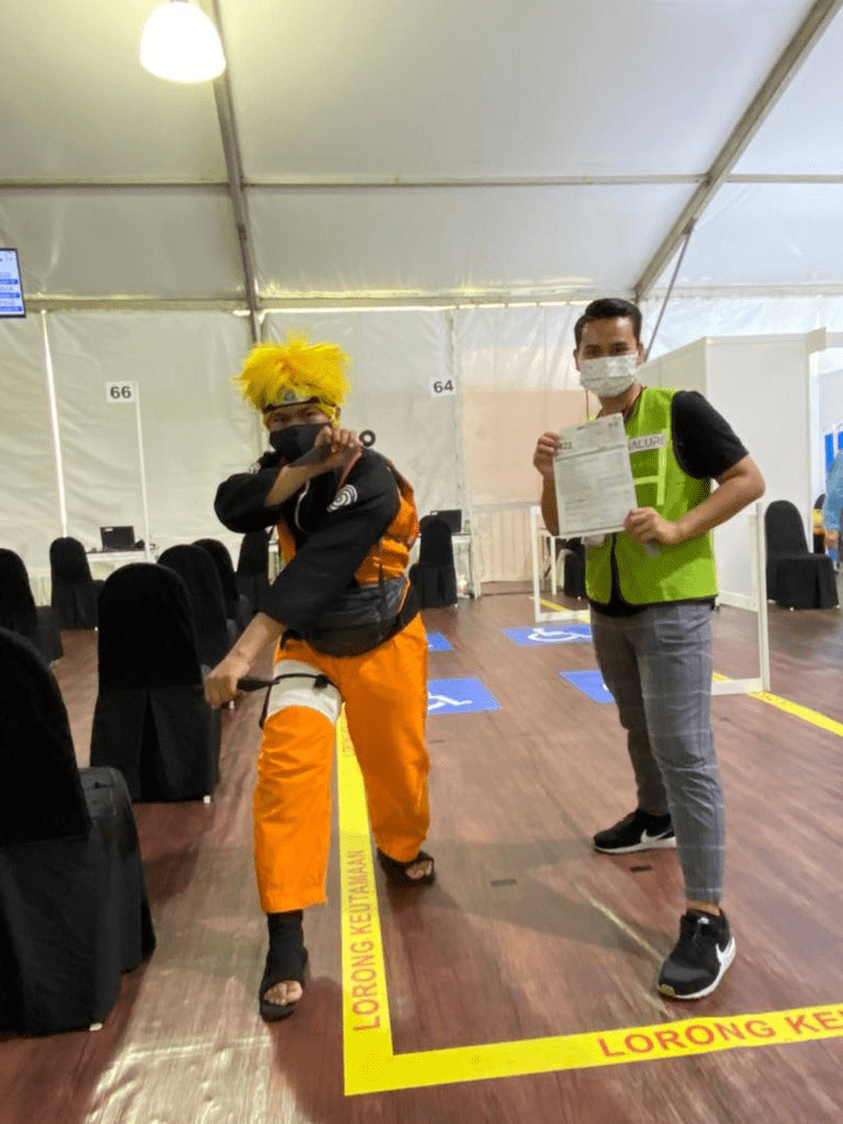 Malaysians wear costumes to vaccination - Naruto