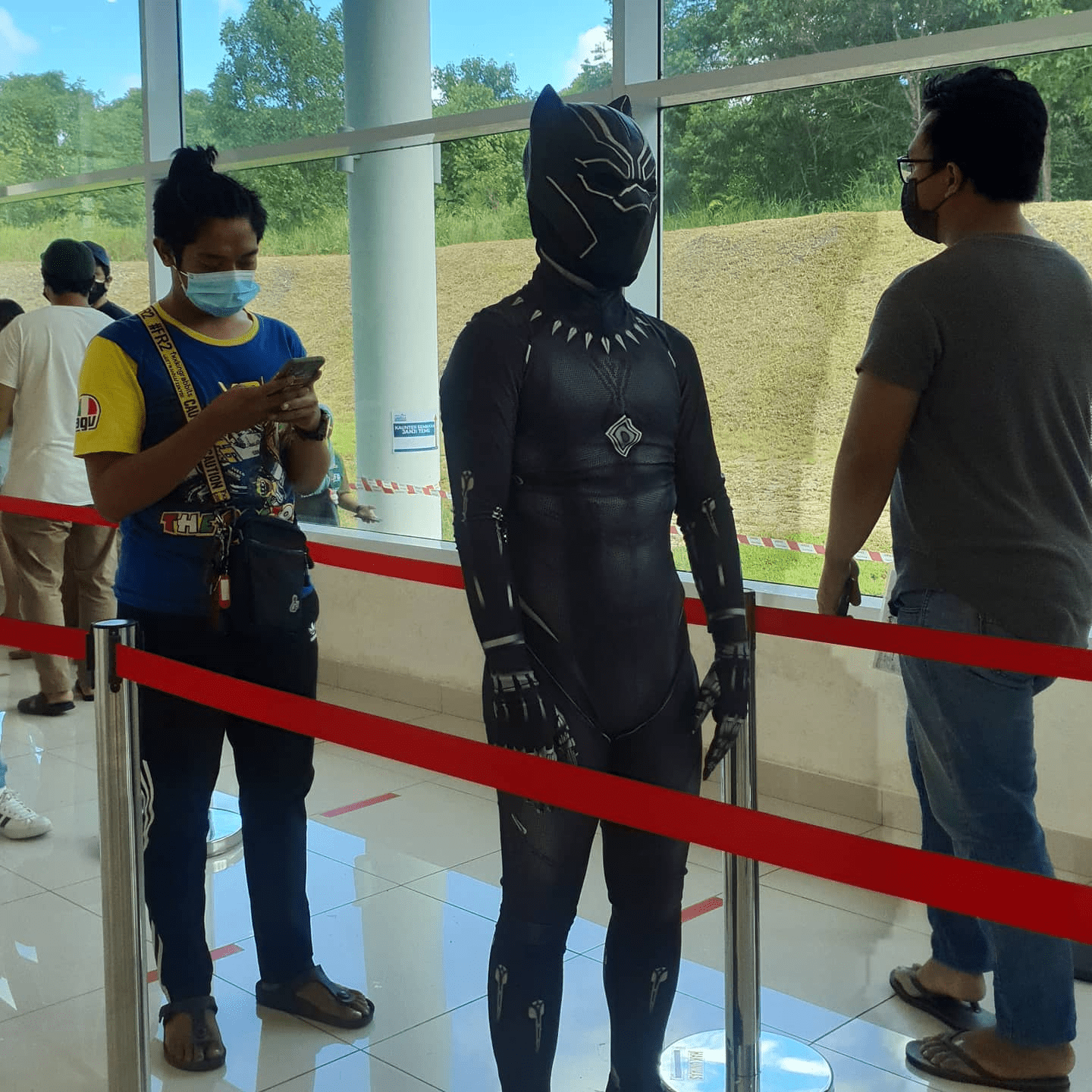 Malaysians wear costumes to vaccination - Black Panther