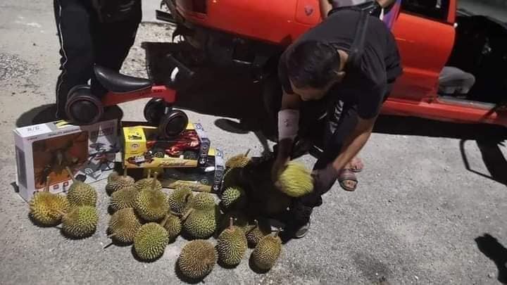 Father trades durians for toys