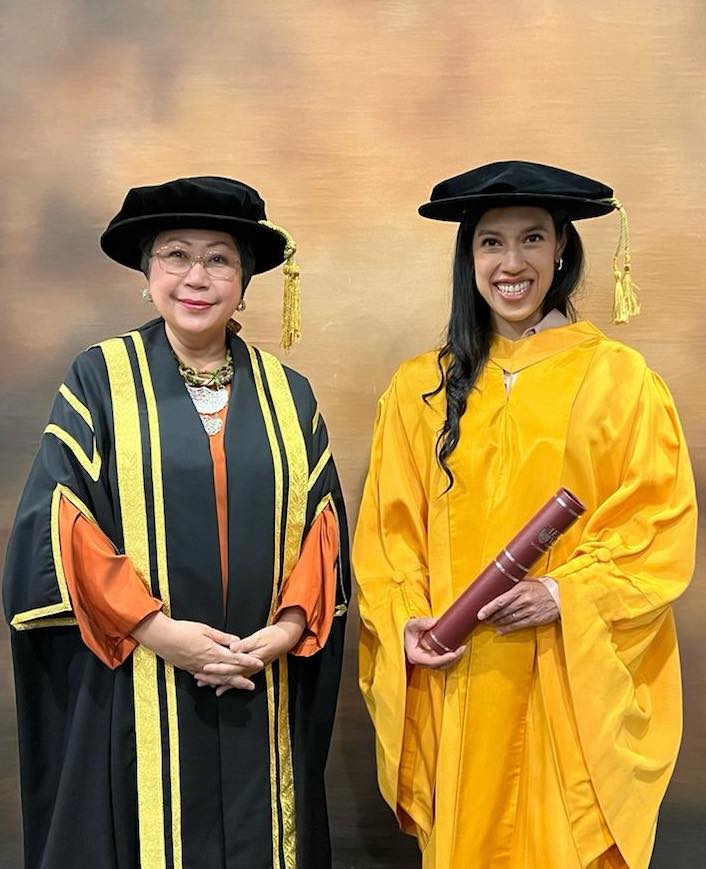 Nicol receiving doctorate degree