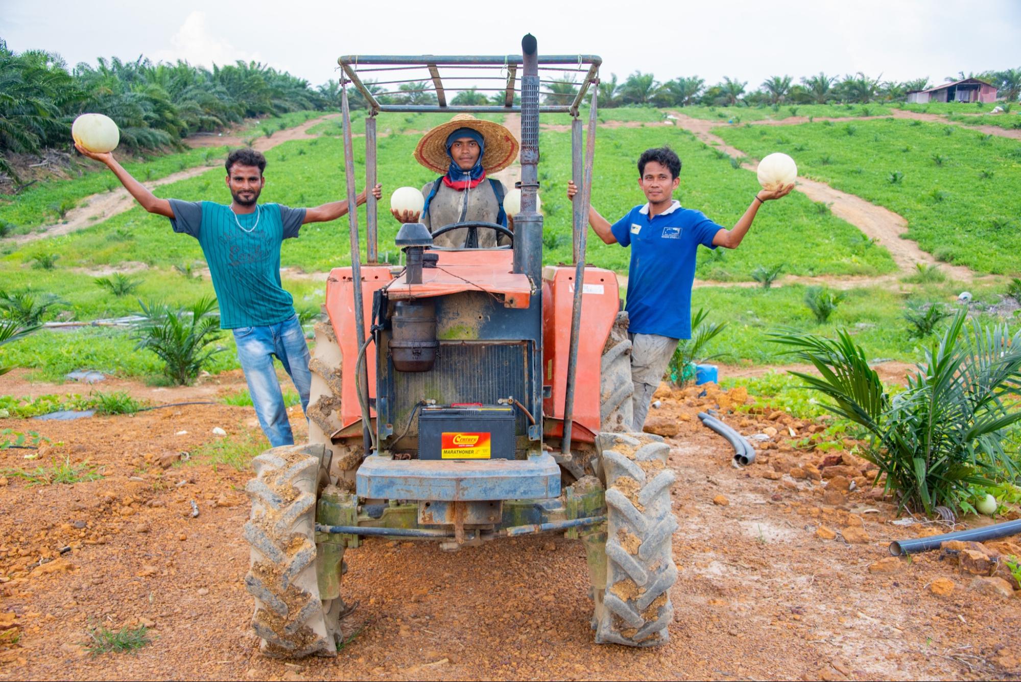 farmers on tractor