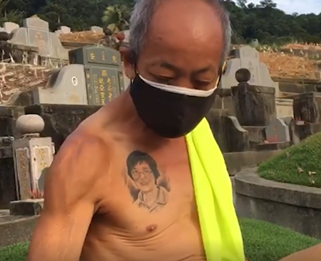 Man visits late wife - tattoo