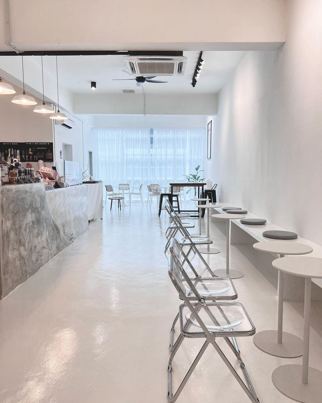 Minimalist white cafes in Kuala Lumpur - dining