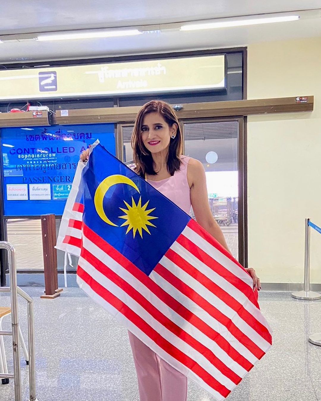first Malaysian crowned as MTQI - arrival in Thailand