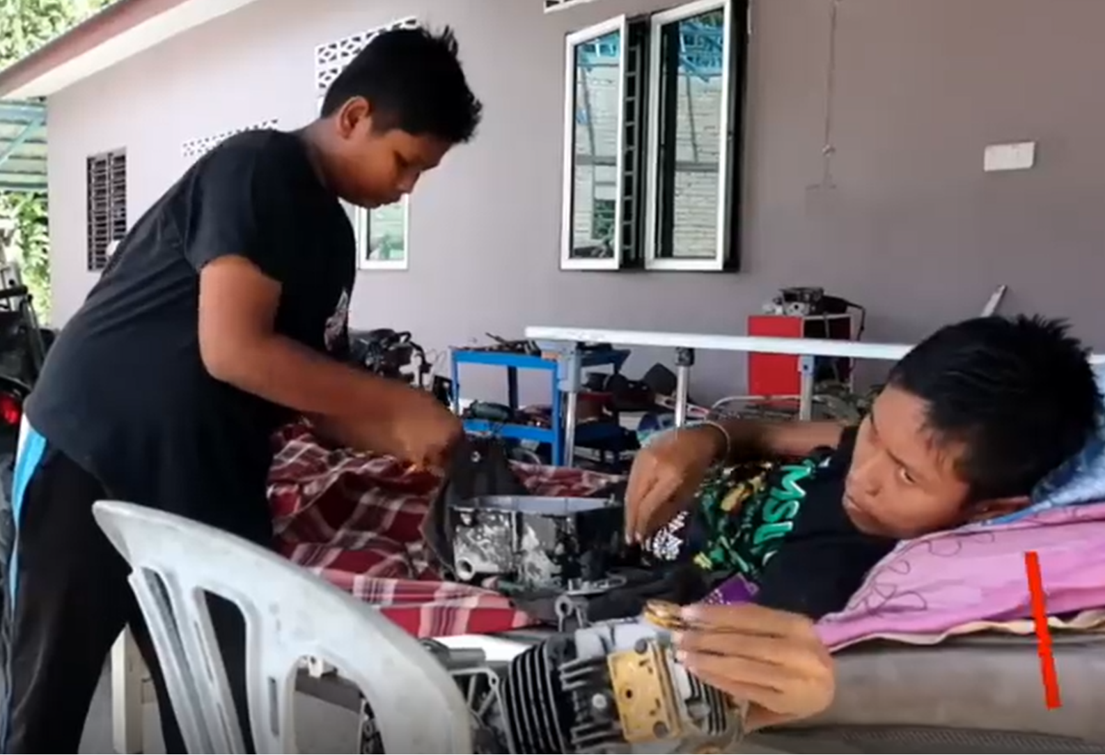 bedridden repairs motorcycle - younger brother