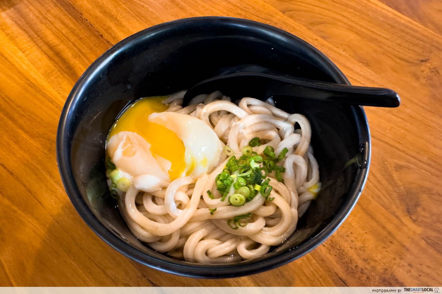Sanuki Udon - house special udon egg poked