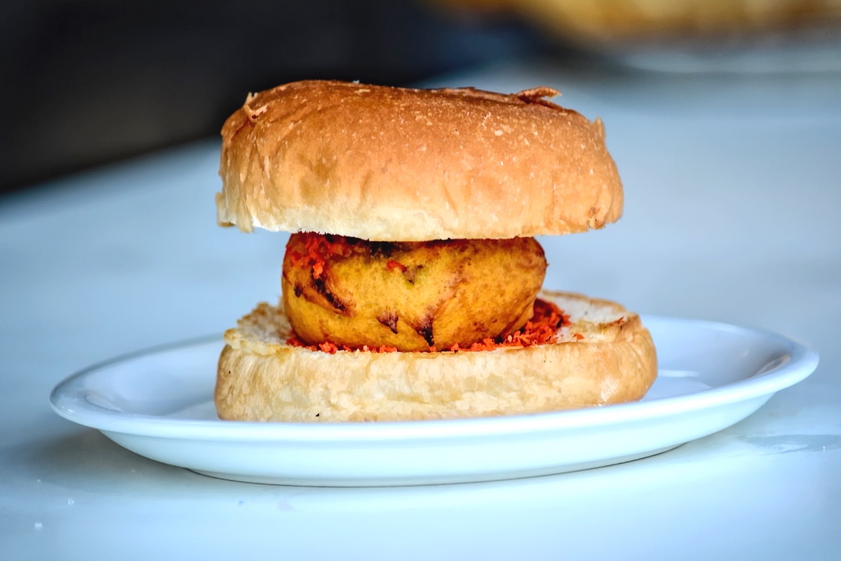 Indian dabeli burger with vegan potato patty