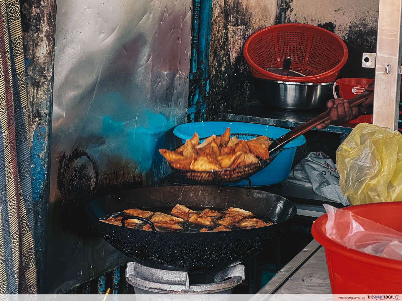 penang famous samosa - frying