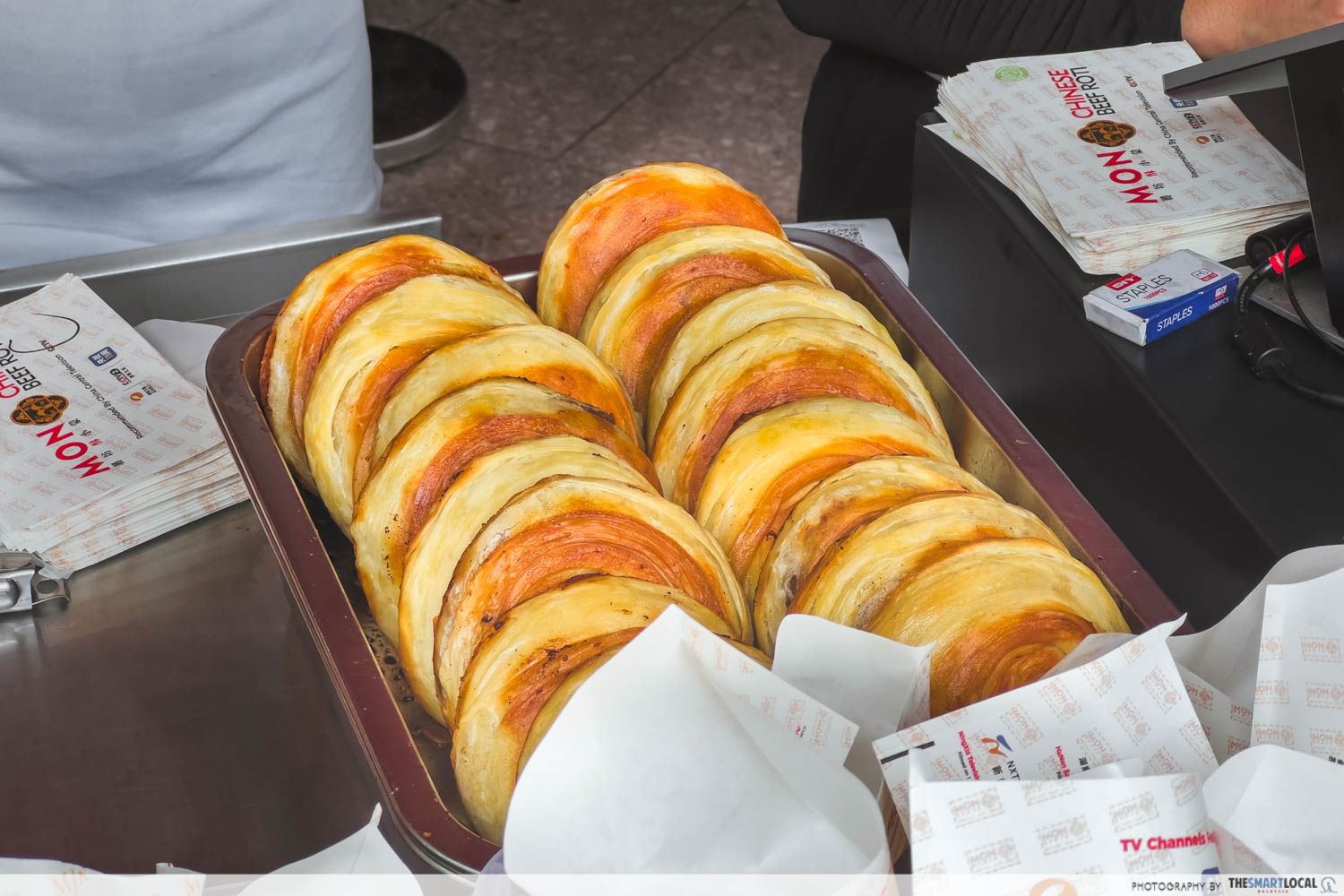a tray of chinese muslim crispy roti after fried