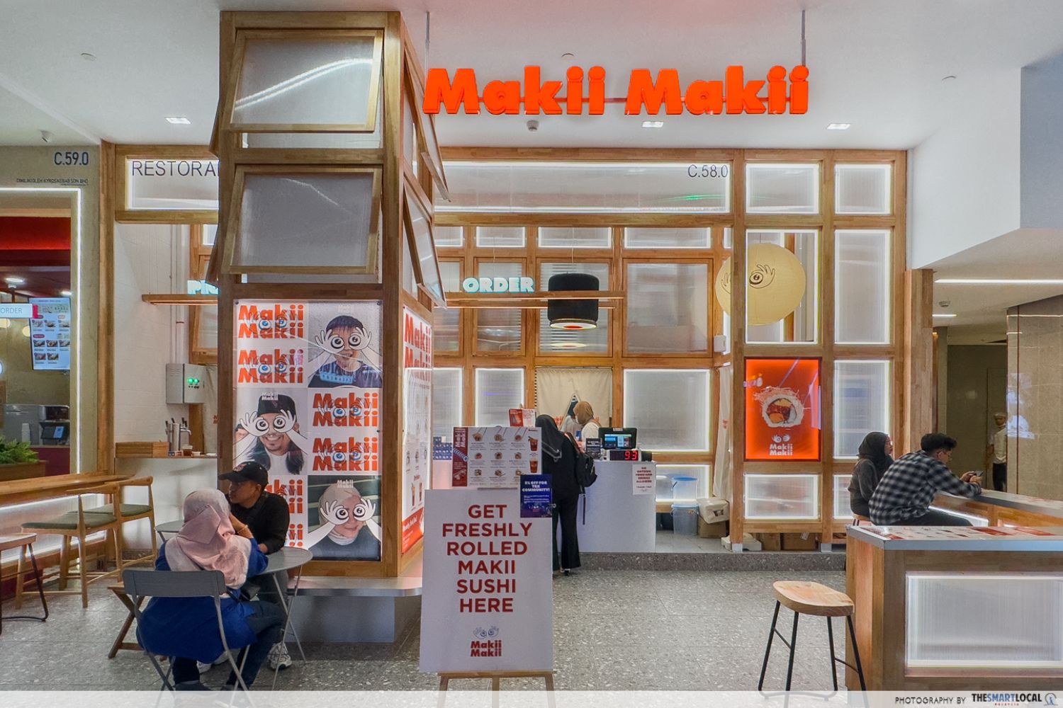 makii makii shopfront, with a neon orange signage