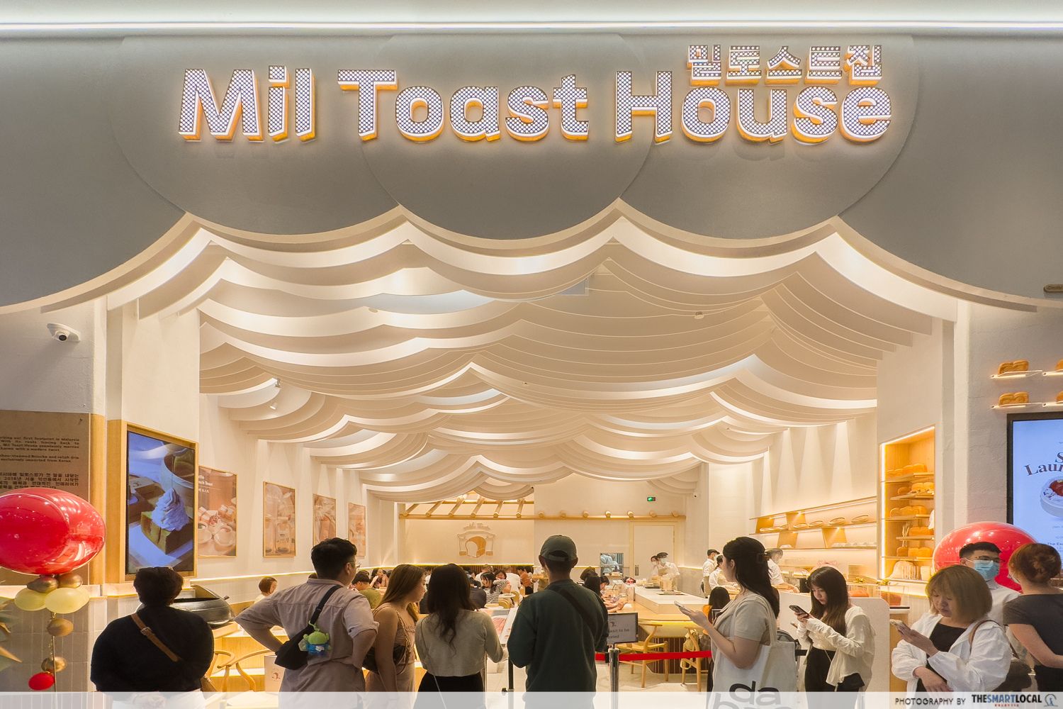 Mil toast house shopfront with a long queue