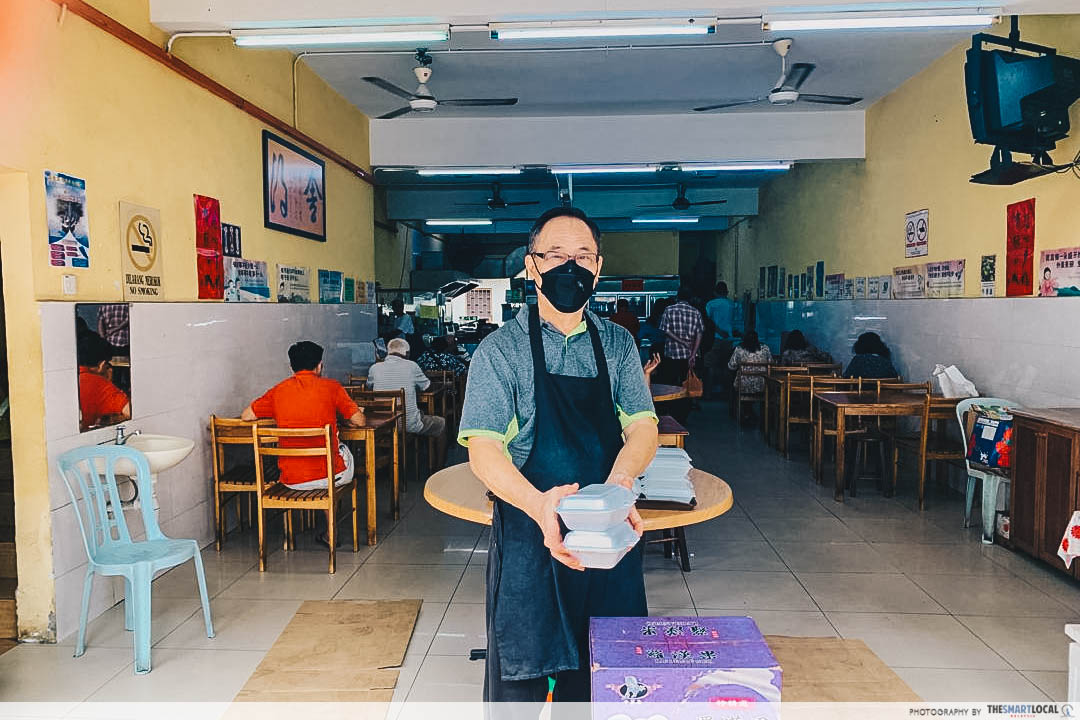 Uncle Richard giving food - V Fortune Land Vegetarian Cafe in KL