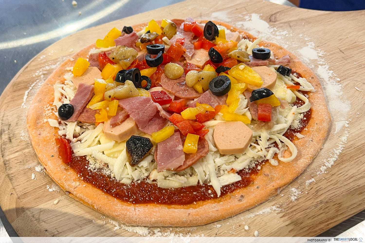 pizza with cheese, tomato spread, unlimited toppings