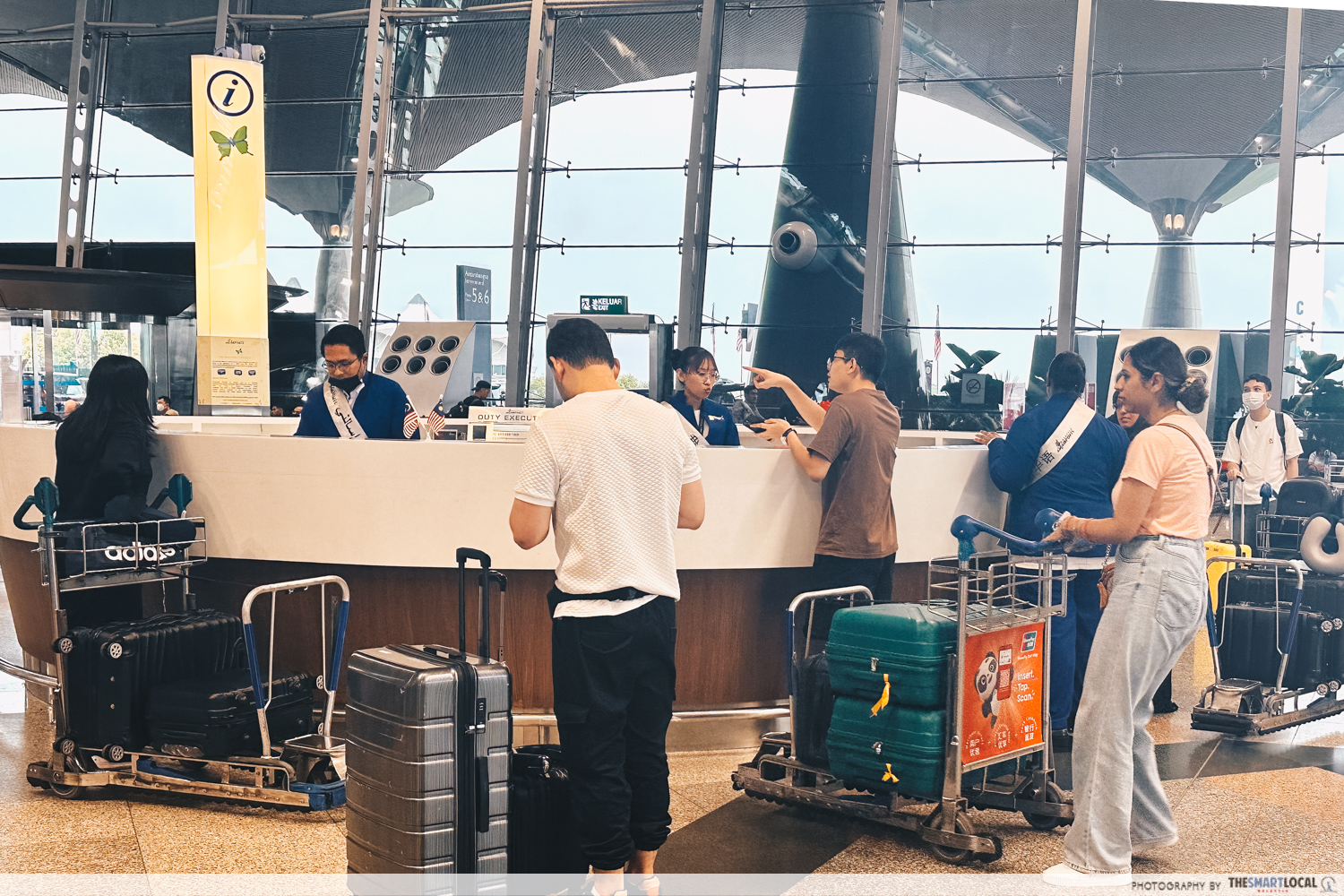 INFORMATION COUNTER AT AIRPORT