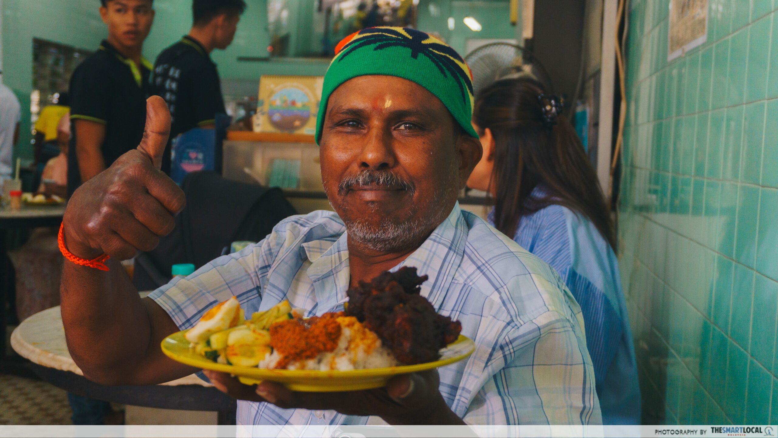 Regular giving a thumbs up with the famous Nasi Ganja