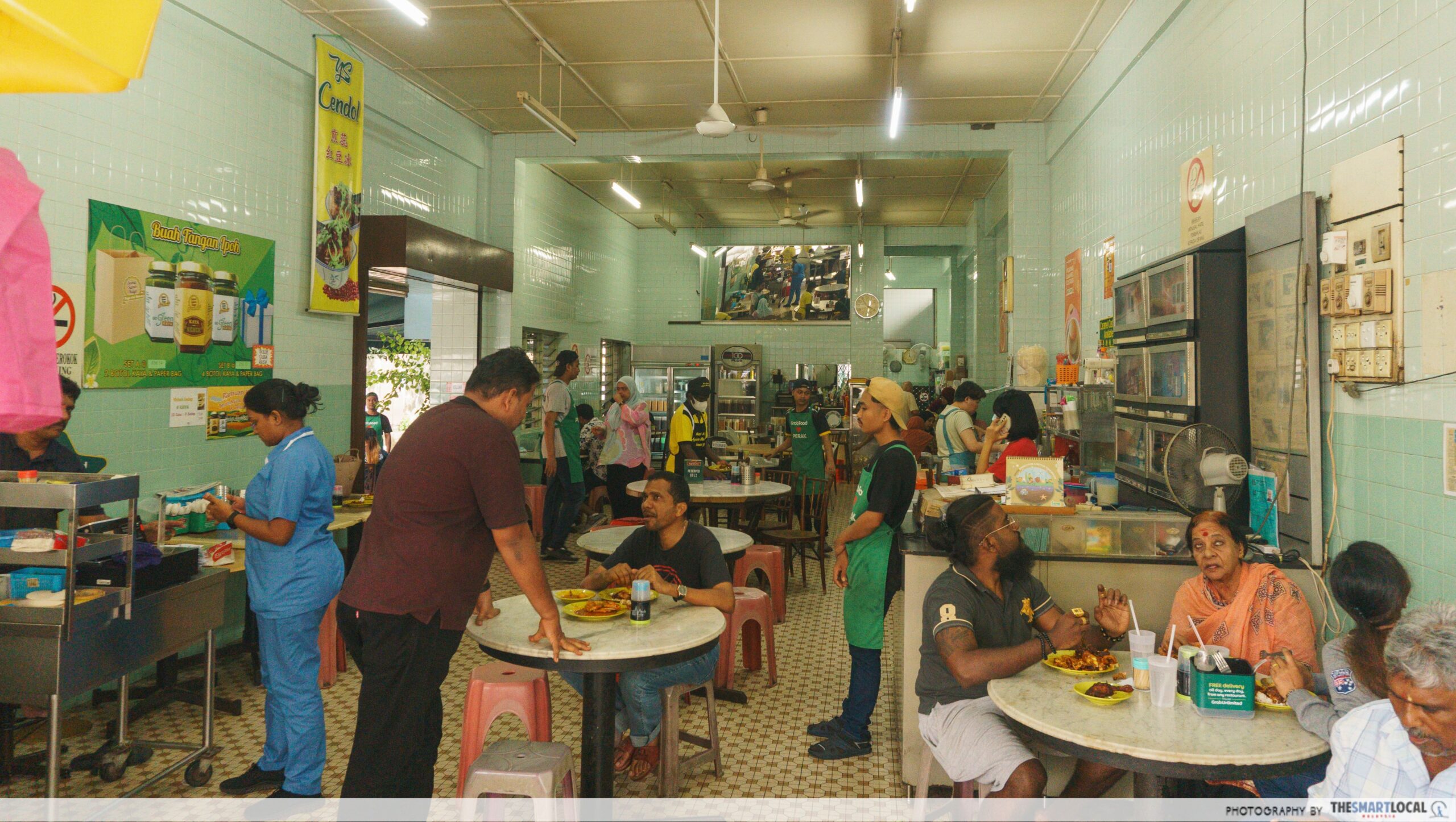 Customers enjoying their food — this place is always packed! 